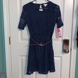 New Navy lace dress with belt. Keyhole opening in back with gold buttons.